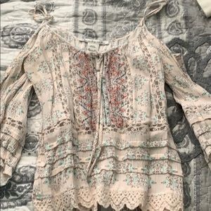 long sleeve, a little off the shoulder shirt